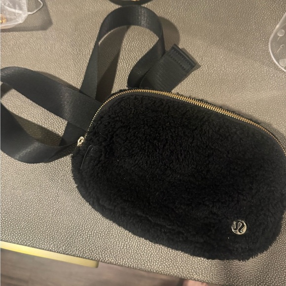 Like new Lululemon black shearling belt bag - Picture 1 of 3